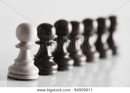Chess pawns in a row