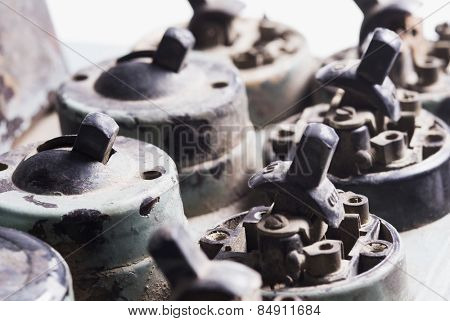 Close-up of broken old lightswitches