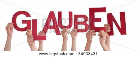 People Holding German Word Glauben Means Believe