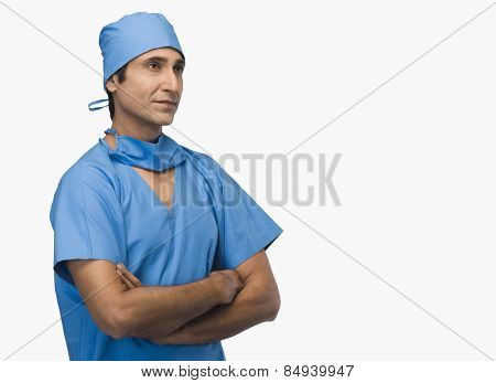 Doctor standing with arms crossed