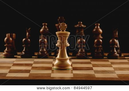 Close-up of chess pieces on a chessboard