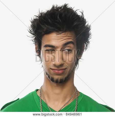 Close-up of a man winking