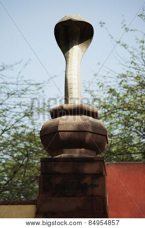 Statue of a snake in a garden, Lakshmi Narayan Temple, New Delhi, India