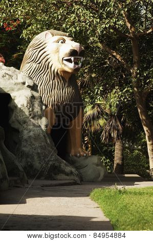 Statue of a lion in a garden, Lakshmi Narayan Temple, New Delhi, India