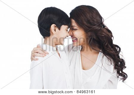 Happy mother and son nuzzling