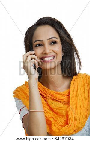Woman talking on a mobile phone and smiling