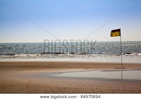 Flag on the beach, Morjim, Pernem, Goa, India