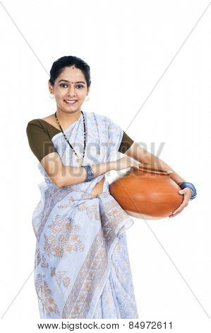 Portrait of a woman carrying a clay pot