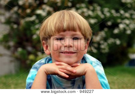 Boy With Chin In Hands