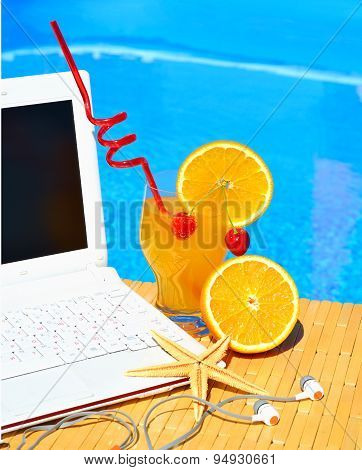 Cocktail, Laptop And Starfish On Pool Background