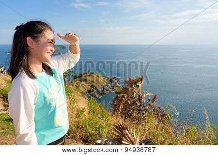 Women Tourists Looking At Beautiful Nature Sea