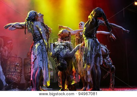 KRAKOW POLAND - JUNE 20 2014: The night of the Music on Szczepanski Square in Cracow. Slavic Prelude perfomed by WATAHA Slavic Drummers and Art Color Ballet shows to the modern viewer colorfull archetype of the Slavic world full of magic