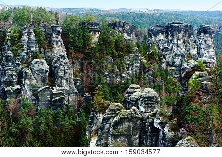 Picturesque view of Bastei. It is a rock formation towering 194 metres above the Elbe River in the Elbe Sandstone Mountains of Germany major landmark of the Saxon Switzerland National Park. Germany