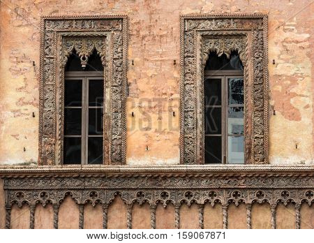 Old window in palace on Piazza Sordello The historic city center of Mantova Lombardy .Italy