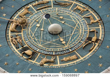 PADUA, ITALY - MAY 3, 2016: Clock tower building of medieval origins overlooking Piazza dei Signori in Padova Italy