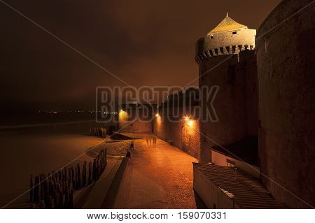 Saint-malo At Night-- Is A Walled Port City In Brittany In Northwestern France On The English Channe