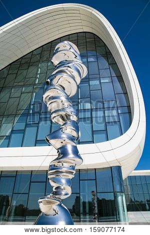 BAKU,AZERBAIJAN-OKT 4, 2016: Statue in front of Heydar Aliyev Center on Oct 4, 2016 in Baku, Azerbaijan. Heydar Aliyev Center won the Design Museum's Designs of the Year Award in 2014