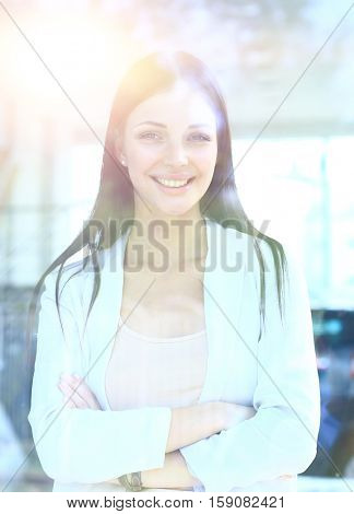 business woman looking thtough window in the office