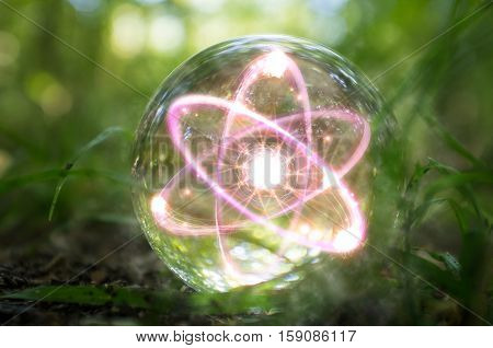 Magic crystal ball atom on forest floor for summer fantasy imagery