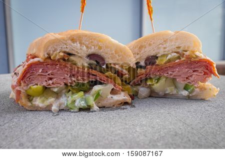 The works Italian sub sandwich with fancy toothpicks