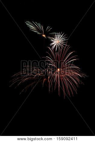 Colorful fireworks isolated in black background,square photo, fireworks in Malta,fireworks festival,long exposure,fireworks isolated with place for text, Independence day, explode