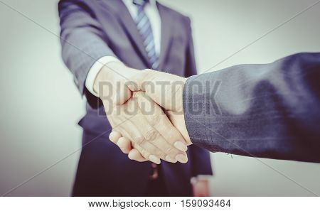 Business Man. Business handshake and business people vintage tone. refinery on sunrise. Business handshake and business people. Shake hands after their meeting. man handshake. Business concept. Business working.