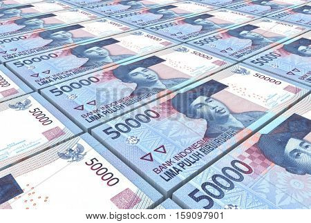 Indonesian rupiah bills stacks background. 3D illustration.