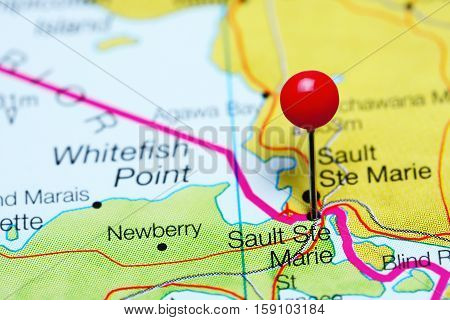 Sault Ste Marie pinned on a map of Michigan, USA