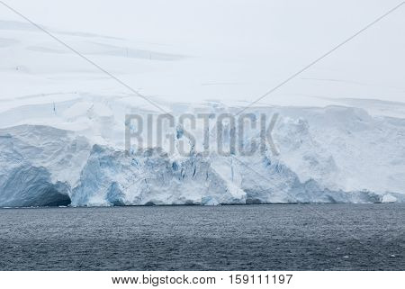 Antarctica in a cloudy day- Antarctic Peninsula - Palmer Archipelago - Neumayer Channel - Global warming - Fairytale landscape