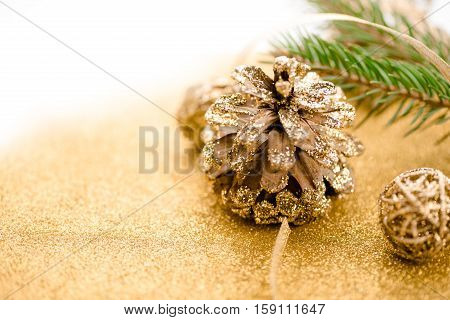 Merry Christmas background. New year. Tree, gold, cones, ornaments