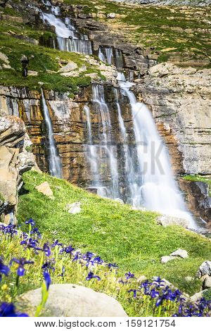 Waterfall de cotatuero under Monte Perdido at Ordesa Valley Aragon Huesca Pyrenees of Spain
