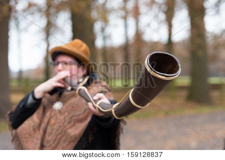 OLDENZAAL NETHERLANDS - NOVEMBER 27 2016: Unknown woman blowing a so called 