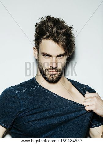 Serious Man Rips Tshirt Open