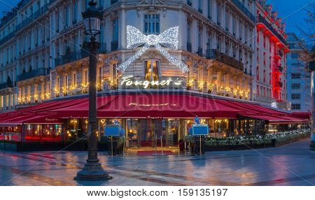Paris France-November 26 2016 : The Christmas decoration on Fouquet's restaurant located at Champs Elysees avenue in Paris.Fouquet's is a historic restaurant was founded in 1889.