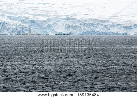 Antarctica in a cloudy day- Antarctic Peninsula - Palmer Archipelago - Neumayer Channel - Global warming - Fairytale landscape
