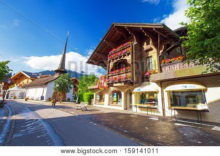 Old City Center Of Gstaad Town, Famous Ski Resort In Canton Bern, Switzerland.