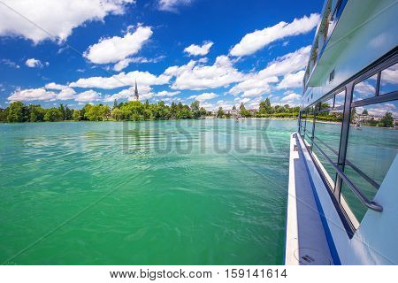 Beautiful Swiss landscape view from famous boat at Lake Zug on a sunny day with blue sky and clouds in summer Canton of Zug Switzerland