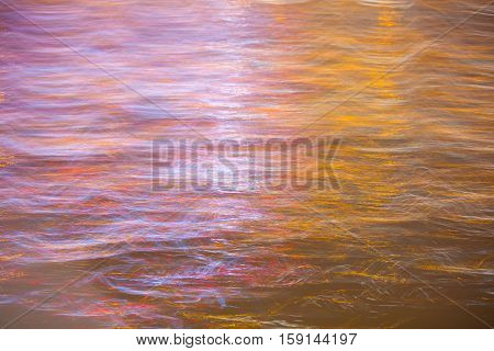 Abstract background made of Christmas lights with long exposure.