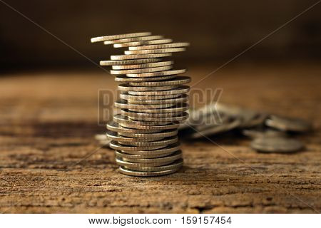 strack of coins make to differrent position concept idea for business or financial instability