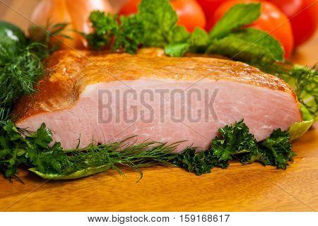 Piece of Smoked Carving Pork Ham. Selective and Soft focus.