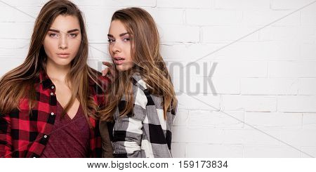 Young Fashionable Girls Posing.