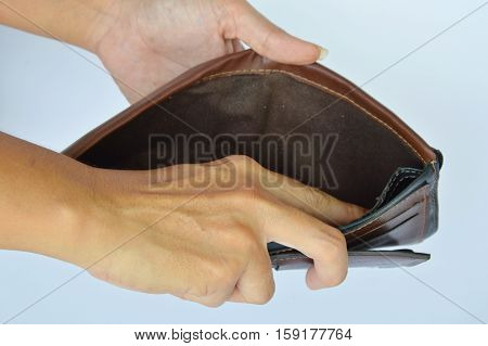 hand try to pick money in wallet but empty