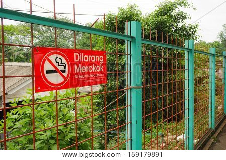 no-smoking sign in fence indonesia java jakarta