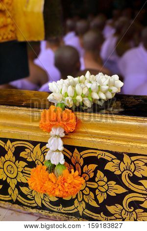 Jasmine garland is placed on the windows of the temple ordained Buddhist tradition background