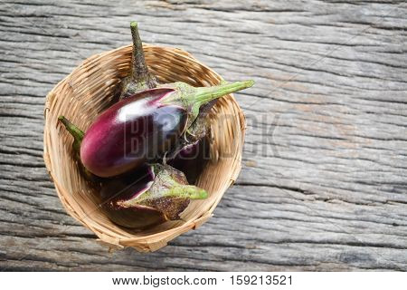 Group of eggplant on old wood background