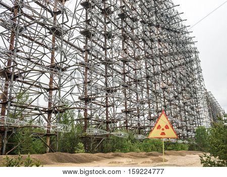 view of the Soviet radar DUGA 3 near Chernobyl with warning sign