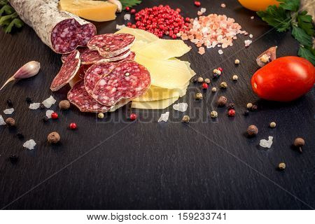 Tasty Fresh Yellow Thin Slice Of Parm Cheese, Salami, Pepper, Himalayan Salt, Tomatoes, Green Parsle