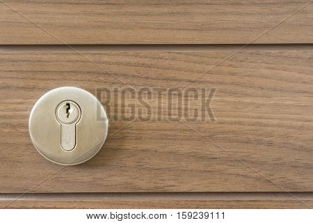 abstract space silver keyway on wood door close-up - can use to display or montage on product