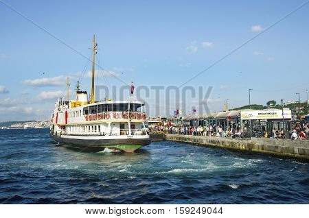 Istanbul Turkey - July 26 2016: Istanbul Ferries Eminonu waiting in the harbor. (called vapur in Turkish) continue to serve as a key public transport link for many Thousands of commuters tourists and vehicles per day.