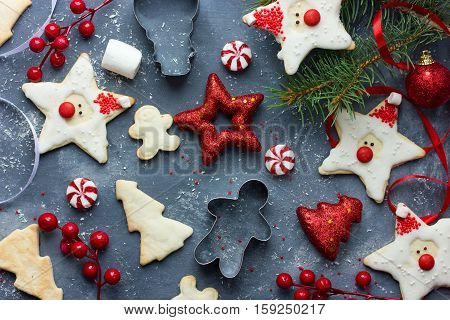 Christmas Holiday Background with various Gingerbread cookies Christmas and New year food Christmas decoration and sweets top view